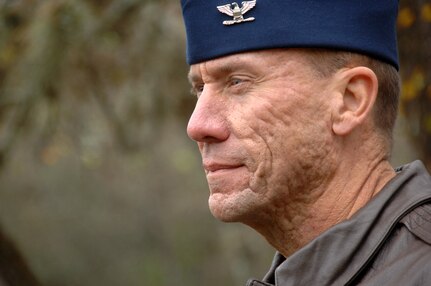 Air Force Col. Mike Roberts, the commander of the Ohio Air National
Guard's 178th Fighter Wing, observes Airman Basic Training Dec. 12, 2007, during a
visit to Lackland Air Force Base. Roberts, who will retire later this
year, was a prisoner of war during the Persian Gulf War more than 20 years ago.