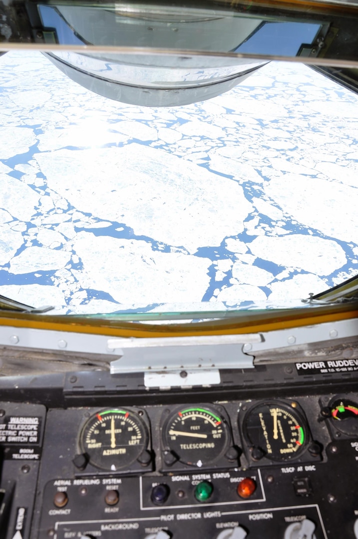 Views from a KC-135 Stratotanker reveal icy plateaus over the Arctic on June 22,2011. A tanker crew from Fairchild Air Force Base, Wash., flew over the North Pole for the first time June 21 to 22, as part of an “iron swap” mission along a new, more efficient route from Moses Lake, Wash., to the Transit Center at Manas, Kyrgyzstan.