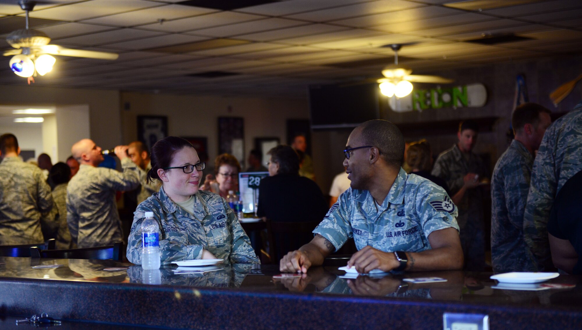Air Commandos spend time together at the Drop Zone June 4, 2015 at Cannon Air Force Base, N.M. After reopening its doors in June, the Drop Zone’s facilities including a dine-in restaurant, and  gaming lounge among others, have exceeded expectations for partronage establishing the DZ a staple for members of Team Cannon. (U.S. Air Force photo/Airman 1st Class Shelby Kay-Fantozzi)