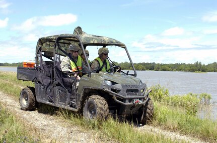 Nebraska Army National Guard members assigned to the 623rd Engineer Company patrol a Missouri River levee near the town of Peru, Neb. The Soldiers have been assisting local and county emergency management officials by conducting multiple patrols of the threatened levees to detect any possible signs of trouble. (U.S. Army photo by Pfc. Justin Zdan) (Released)