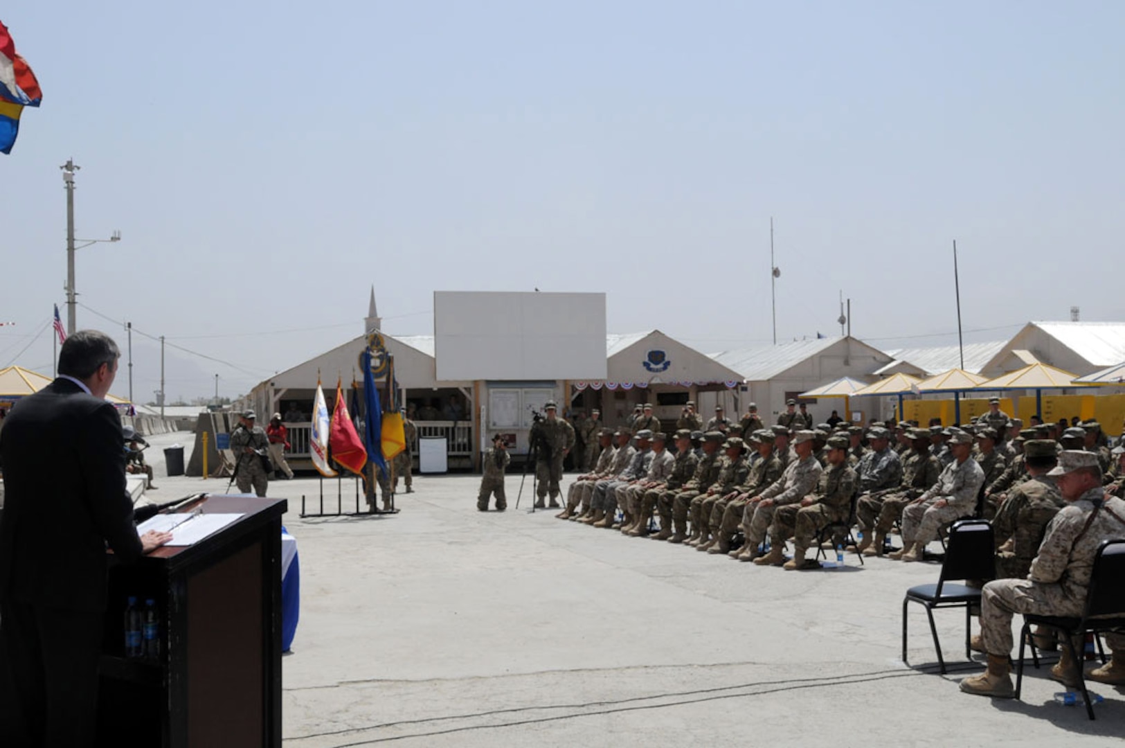 Soldiers, Sailors, Airmen and Marines gathered in Patriot Square on Camp
Phoenix Kabul, Afghanistan, to swear an oath. On the day of American
Independence, 48 service members deployed to Afghanistan in the support of
Operation Enduring Freedom were naturalized as United States Citizens.
"This group that's here truly represents the values and diversity of America,"
said Ambassador Karl Eikenberry, U.S. ambassador to Afghanistan. "Each of you
are clearly doing your part to ensure America's success," he added. Among the
naturalized service members: Bronze Star and Purple Heart recipients. 