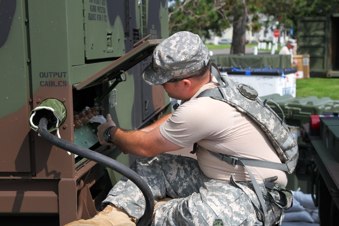 U.S. Army Reserve Sgt. Michael Williams prepares generators for veterinary services during Greater Chenango Cares in Chenango, N.Y., July 12, 2015. Williams is a utility equipment repair specialist assigned to the 48th Combat Support Hospital, Fort Story, Va.
