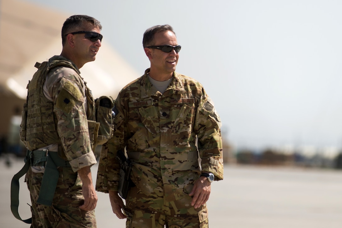 U.S. Air Force Brig. Gen. Dave Julazadeh, left, commander of 455th Air ...