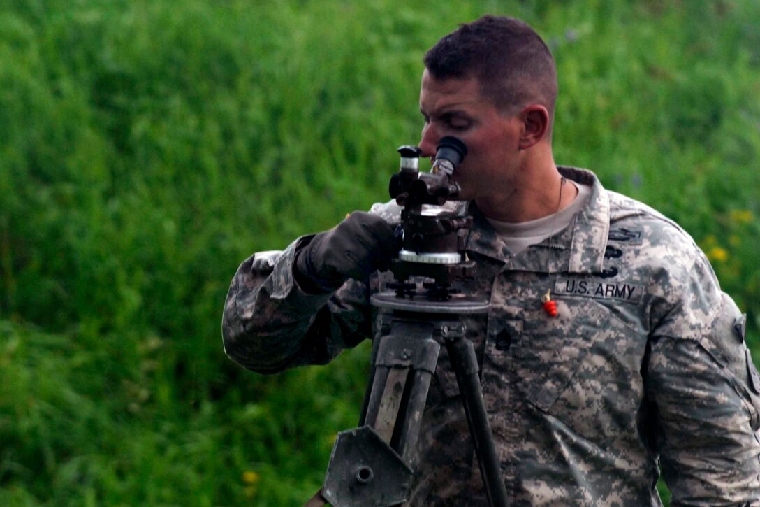 A soldier prepares to participate in a live-fire using M120 and M224 mortars during an Exportable Combat Training Capability exercise on Fort Drum, N.Y., July 14, 2015.