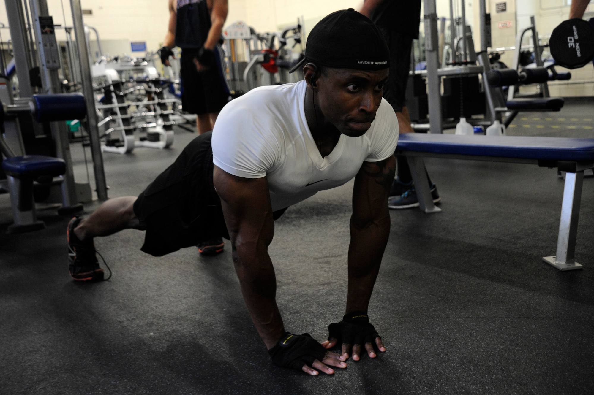 Staff Sgt. Chris Moore, 30th Comptroller Squadron customer support NCO, performs a diamond push-up, July 20, 2015, Vandenberg Air Force Base, Calif. In addition to managing his Airmen, his duties as a Physical Training Leader and maintaining a grueling workout schedule, Moore currently is a men’s physique competitor under the National Physique Committee, the largest amateur bodybuilding organization in the U.S. (U.S. Air Force photo by Airman 1st Class Robert J. Volio/Released)