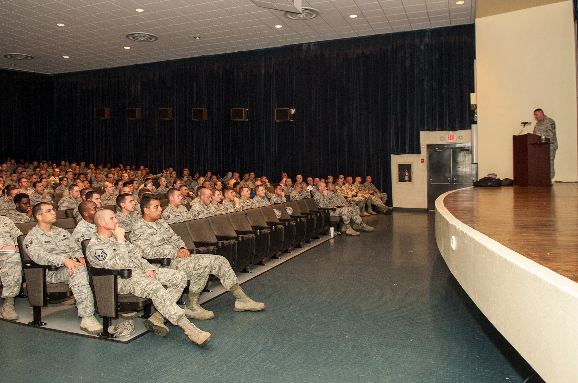 Chief Master Sgt. Jeff Gabrelcik, U.S. Air Force Headquarters chief of personnel policy, speaks to the Airmen in attendance during an Air Force Personnel Command Roadshow, July 21, 2015, at Seymour Johnson Air Force Base, North Carolina. During the roadshow, Gabrelcik discussed all  upcoming changes made to the Enlisted Evaluation System and Weighted Airman Promotion System. (U.S. Air Force photo/Airman Shawna L. Keyes) 