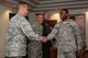 Col. Steven F. Jamison, 108th Maintenance Group commander, left, welcomes Gen. Darren W. McDew, Air Mobility Command commander, to the 108th Wing at Joint Base McGuire-Dix-Lakehurst, N.J., July 22, 2015. McDew visited the wing to meet with Airmen to discuss the current and future flying platforms of the Air National Guard. (U.S. Air National Guard photo by Airman 1st Class Julia Pyun/Released)
