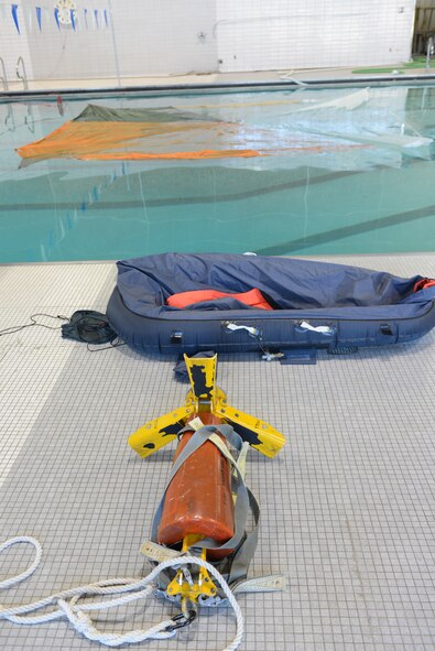 In the event of an emergency ejection over a large body of water, aviators will need to know how to properly use water survival equipment. Airmen from the 2nd Operations Support Squadron Survival, Evasion, Resistance and Escape teach aircrew members survival skills and how to use water survival equipment. (U.S. Air Force photo/Staff Sgt. Benjamin Gonsier)