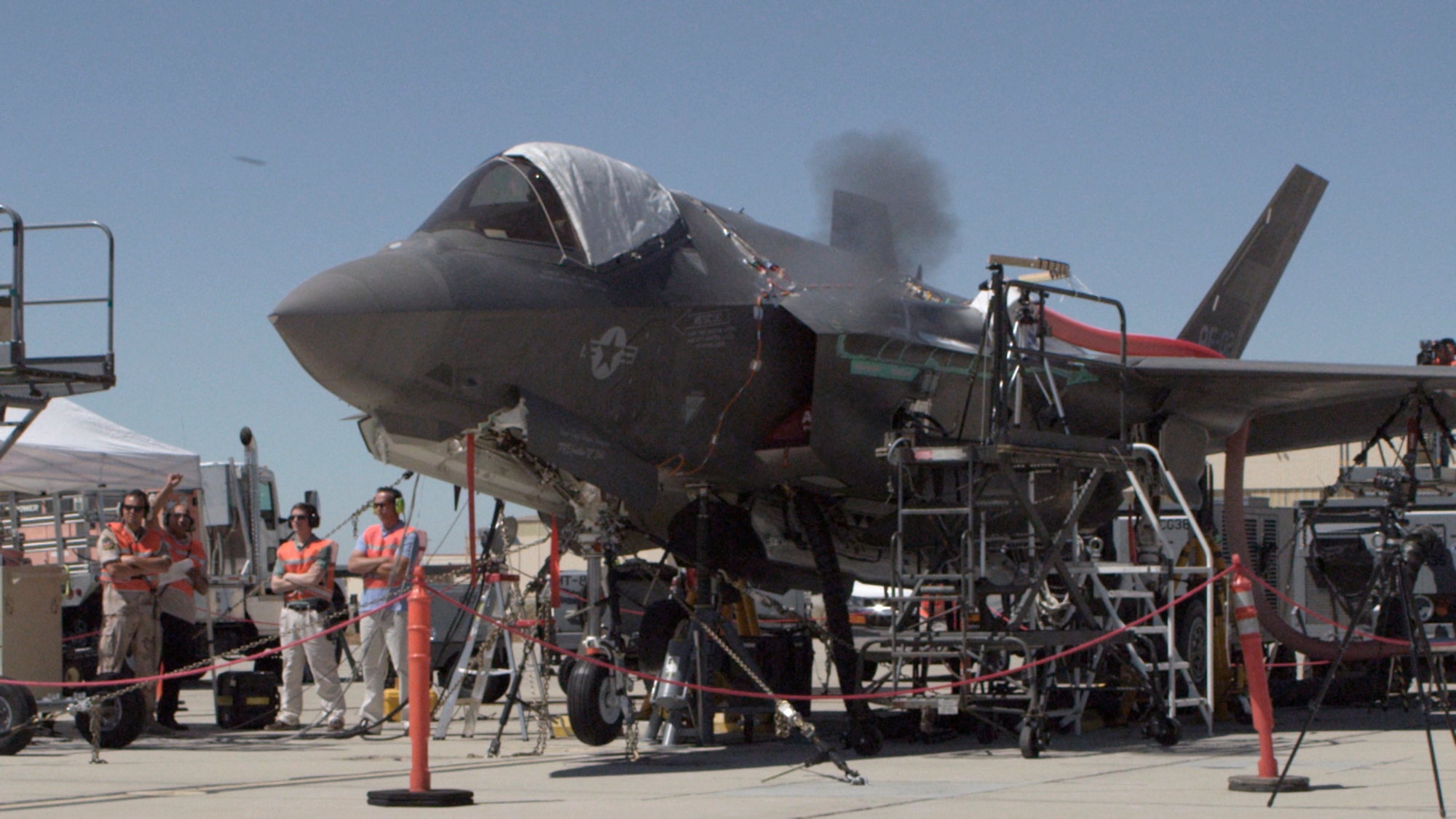 An F-35A, tail number AF-2, fires a burst of rounds down range at the Gun Harmonizing Range July 17. The F-35 Joint Strike Fighter Integrated Test Force at Edwards AFB is in the process of testing the F-35A’s newest munitions asset - the GAU-22/A. The gun is a four-barrel Gatling gun that fires 25 millimeter rounds. (Courtesy photo by Darin Russell/Lockheed Martin)