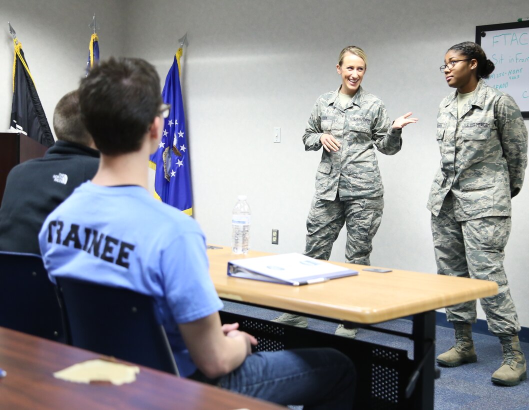 New trainees listen intently to higher ranking experienced Airmen as current 932nd Airlift Wing members speak to the newcomers to military service, and welcome them to the Air Force Reserve ranks at Scott Air Force Base. Those getting ready to go to basic training are able to work on drill and ceremony practice during the Illinois Air Force Reserve Command monthly unit training assembly. The staff can be reached during the drill weekend. The 932nd AW is an Air Force Reserve Unit that flies the C-40C. (U.S. Air Force photo/Tech Sgt. Christopher Parr)