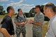 Bulgarian air force Maj. Ludmil Volkov and Lt. Nick Dimitrov, from left, maintenance and logistics officers, U.S. Air Force Maj. Joseph Leonard, maintenance officer, and Bulgarian air force Capt. Tsacho Sabef, maintenance officer, discuss the logistics of rapid cargo unloading at Graf Ignatievo Air Base, Bulgaria, on July 16, 2015. The officers are participating in Thracian Star 2015, a bilateral training exercise to enhance interoperability with the Bulgarian air force and to bolster readiness to conduct combined air operations. (U.S. Air National Guard photo by Master Sgt. Andrew J. Moseley/Released)