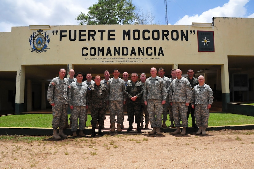 SOTO CANO AIR BASE, Honduras – Maj. Gen. K. K. Chinn, U.S. Army South commanding general (center left), poses with Honduran Army Colonel Jose Angel Juarez, Commander of the 5th Battalion in Mocoron, Colonel Hedbreth Caballero, Honduran Armed Forces' Liaison to Joint Task Force-Bravo, and leaders from Army South and JTF-Bravo during a visit to Mocoron July 18, 2015. Chinn paid a three-day visit to JTF-Bravo, during which he reviewed U.S. and Honduran efforts to counter transnational organized crime and build partnerships. (U.S. Air Force photo by Capt. Christopher Love)
