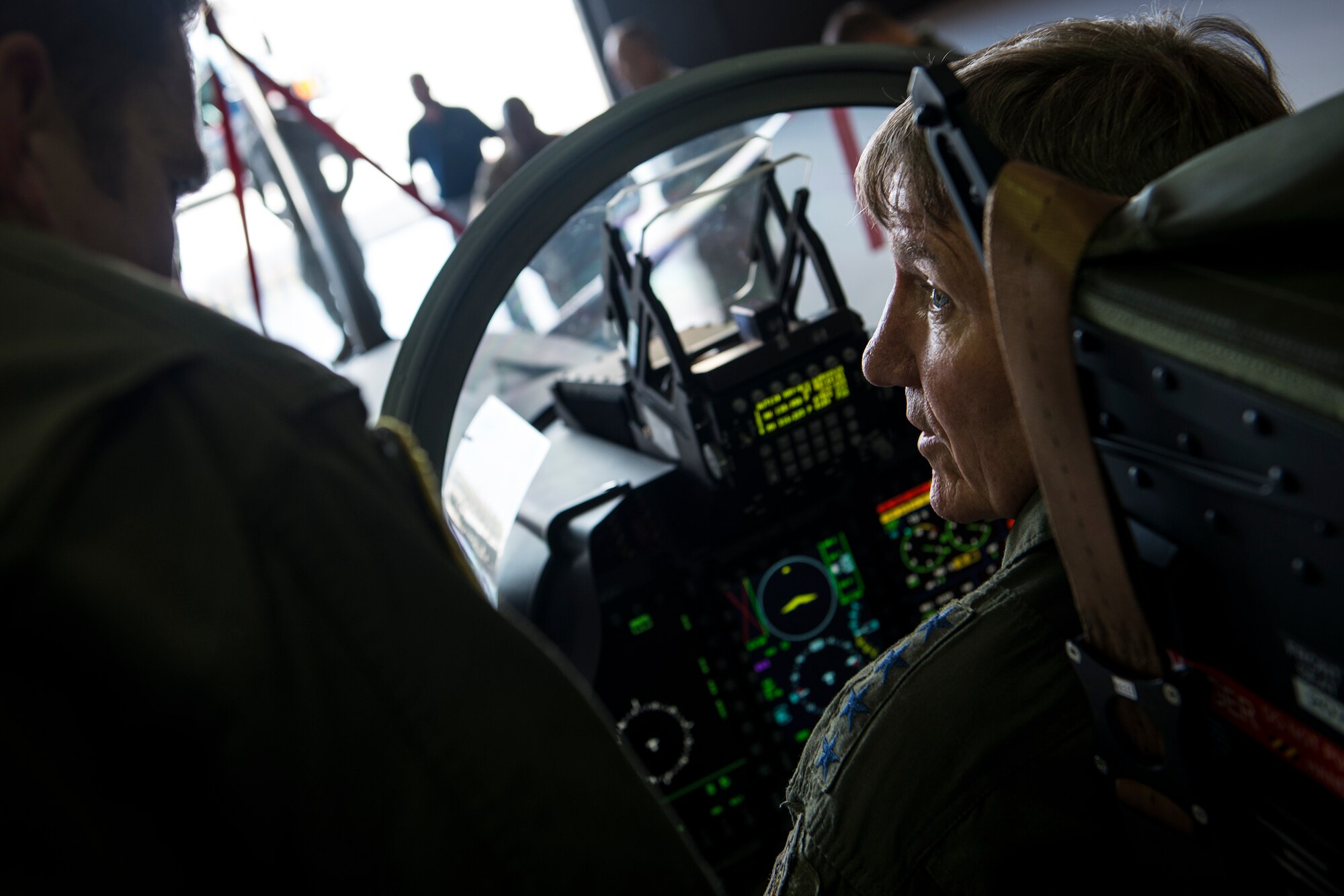 U.S. Air Force Gen. Hawk Carlisle, right, commander Air Combat Command, speaks with an instructor pilot from the 81st Fighter Squadron July 15, 2015, at Moody Air Force Base, Ga. The 81st FS has the newest mission hosted at Moody. (U.S. Air Force photo by Senior Airman Ryan Callaghan/Released)
