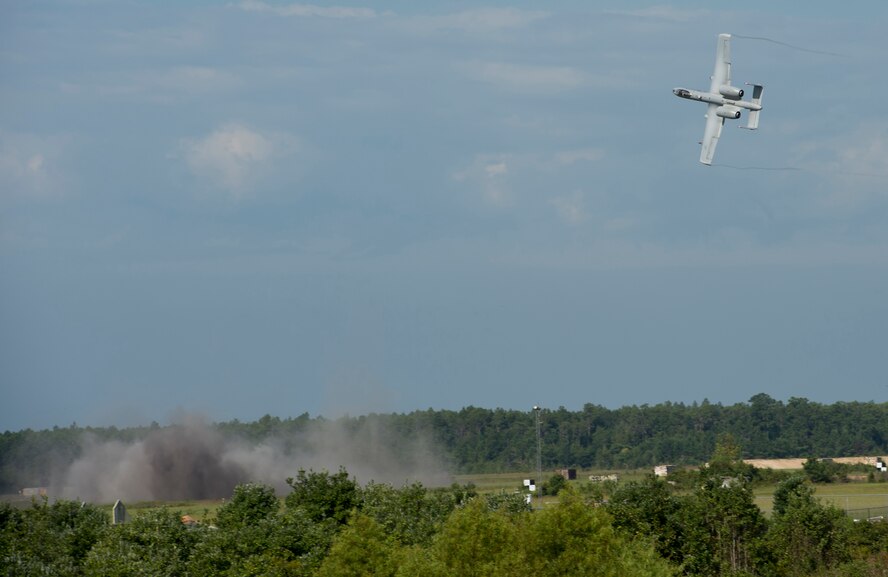An A-10C Thunderbolt II turns after performing a strafe run during a combat search and rescue demonstration July 15, 2015, at Moody Air Force Base, Ga. U.S. Air Force Gen. Hawk Carlisle’s, commander Air Combat Command, observed how A-10s carry out close-air-support missions while visiting Airmen. (U.S. Air Force photo by Staff Sgt. Eric Summers Jr./Released)