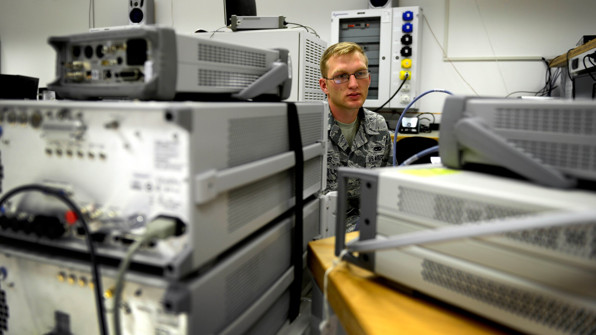 U.S. Air Force Senior Airman Christopher Wahrmund, 31st Maintenance Squadron precision measurement equipment laboratory test management diagnostic equipment technician, calibrates a spectrum analyzer, July 20, 2015, at Aviano Air Base, Italy. The shop technicians help ensure accuracy and reliability of all weapons systems here. In addition, they calibrate and repair measurement, test and diagnostic equipment. (U.S. Air Force photo by Senior Airman Areca T. Wilson/Released)