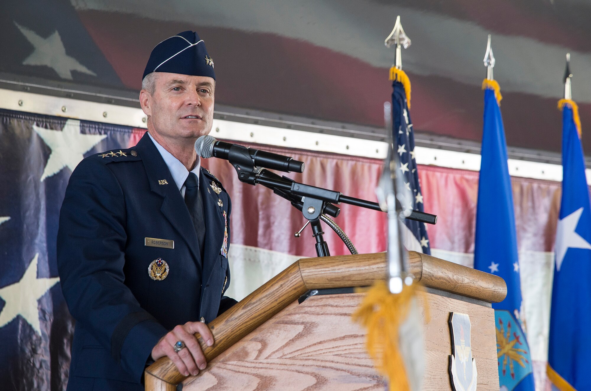 JOINT BASE SAN ANTONIO-RANDOLPH, Texas -- Lt. Gen Darryl Roberson, commander of Air Education and Training Command, speaks during the AETC change of command ceremony at Joint Base San Antonio-Randolph, Texas, July 21, 2015. Roberson is a command pilot who has more than 5,000 flight hours including 865 combat hours. Roberson will oversee the operation of 10 major installations in five states. The mission of AETC is to recruit, train and educate Airmen to deliver Air Power for America. Roberson was previously the 3rd Air Force and 17th Expeditionary Air Force commander at Ramstein Air Base, Germany. (U.S. Air Force photo by Johnny Saldivar) 
