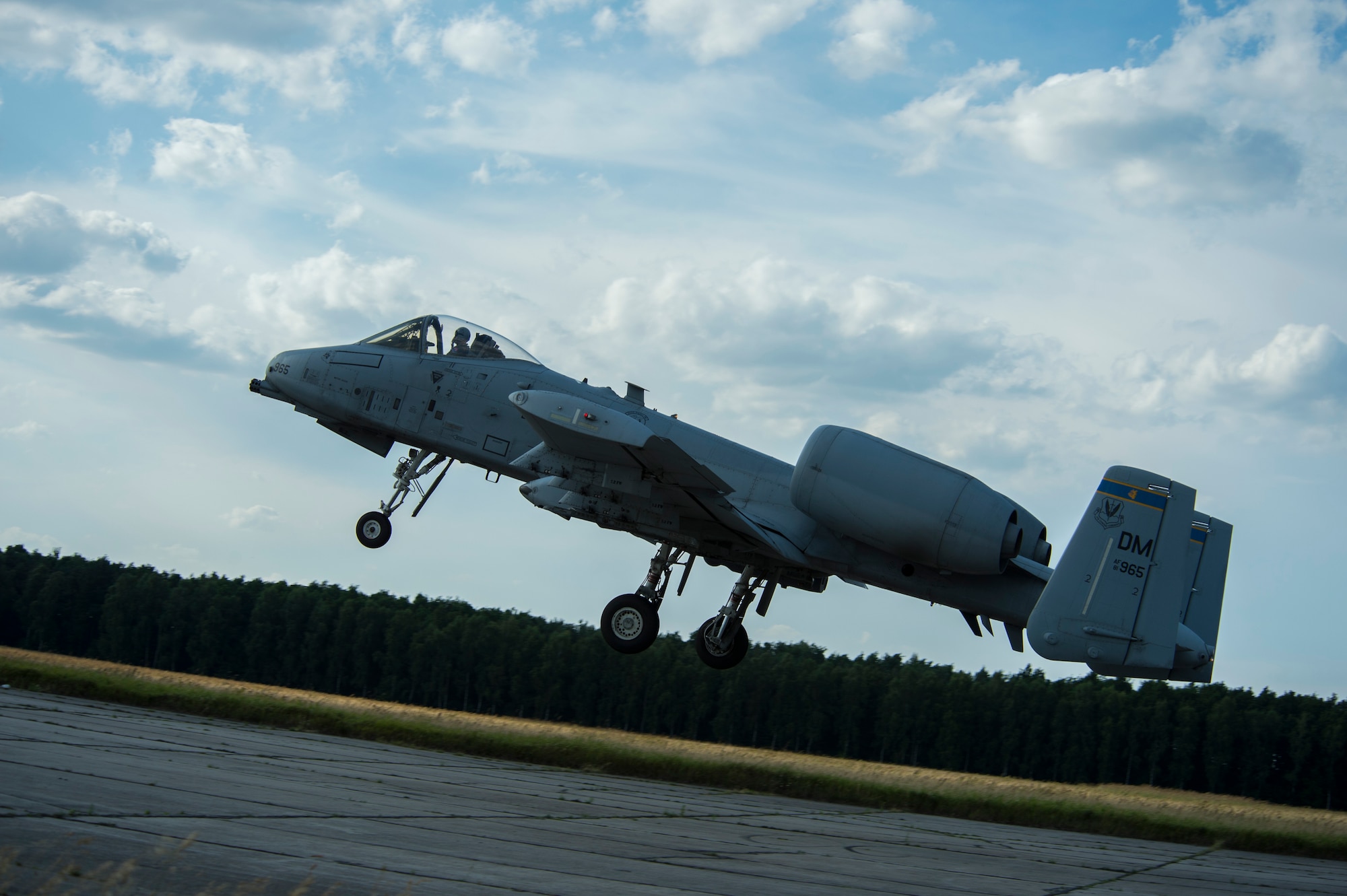 A 354th Expeditionary Fighter Squadron A-10C Thunderbolt II aircraft takes off during an austere landing training exercise at Nowe Miasto, Poland, July 20, 2015. The deployed A-10s are part of the first European Theater Security Package. (U.S. Air Force photo by Airman 1st Class Luke Kitterman/Released)