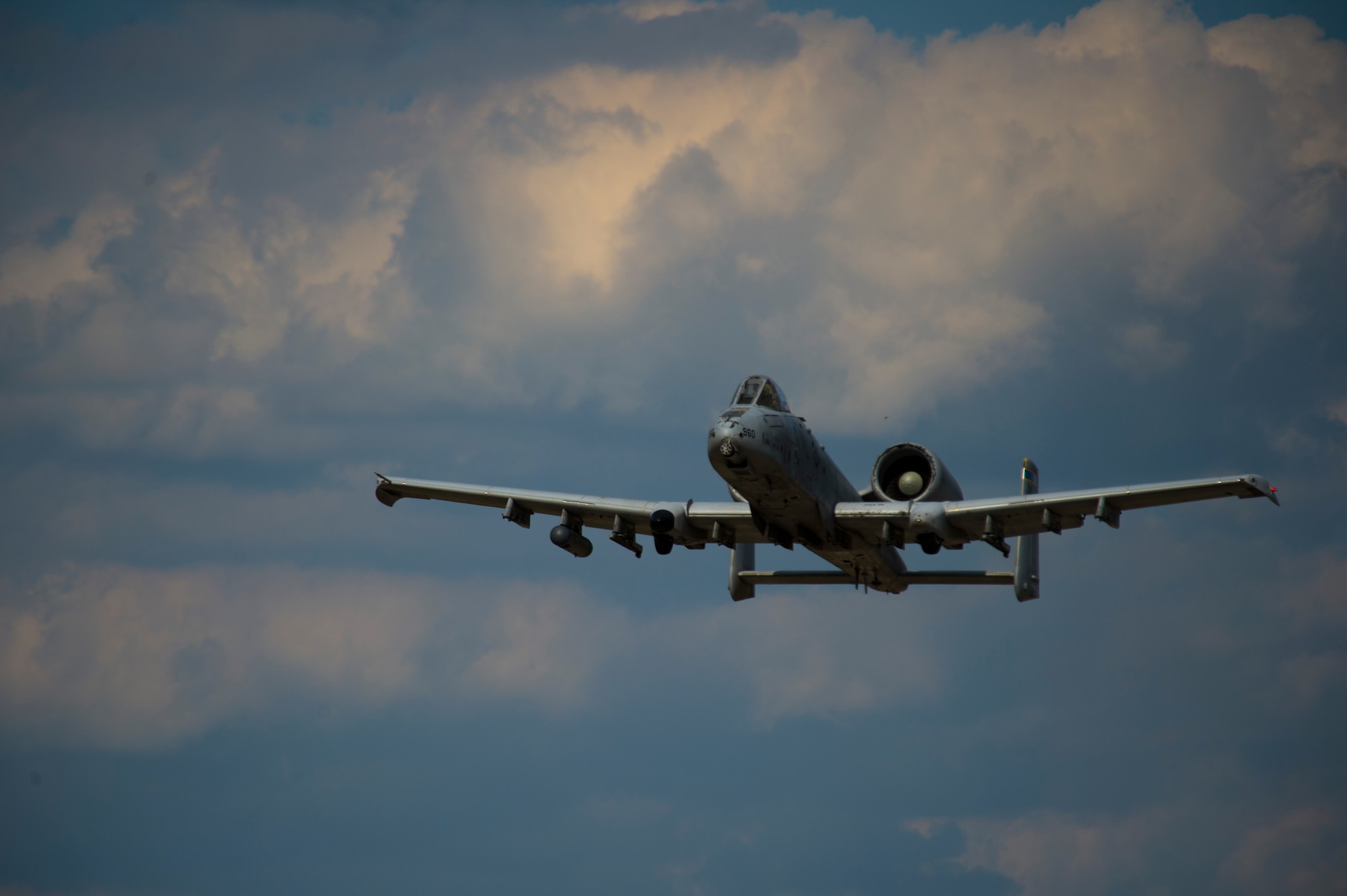 A 354th Expeditionary Fighter Squadron A-10C Thunderbolt II aircraft soars through the sky during an austere landing training exercise at Nowe Miasto, Poland, July 20, 2015. The 354th EFS is currently operating at Lask Air Base, Poland. (U.S. Air Force photo by Airman 1st Class Luke Kitterman/Released)