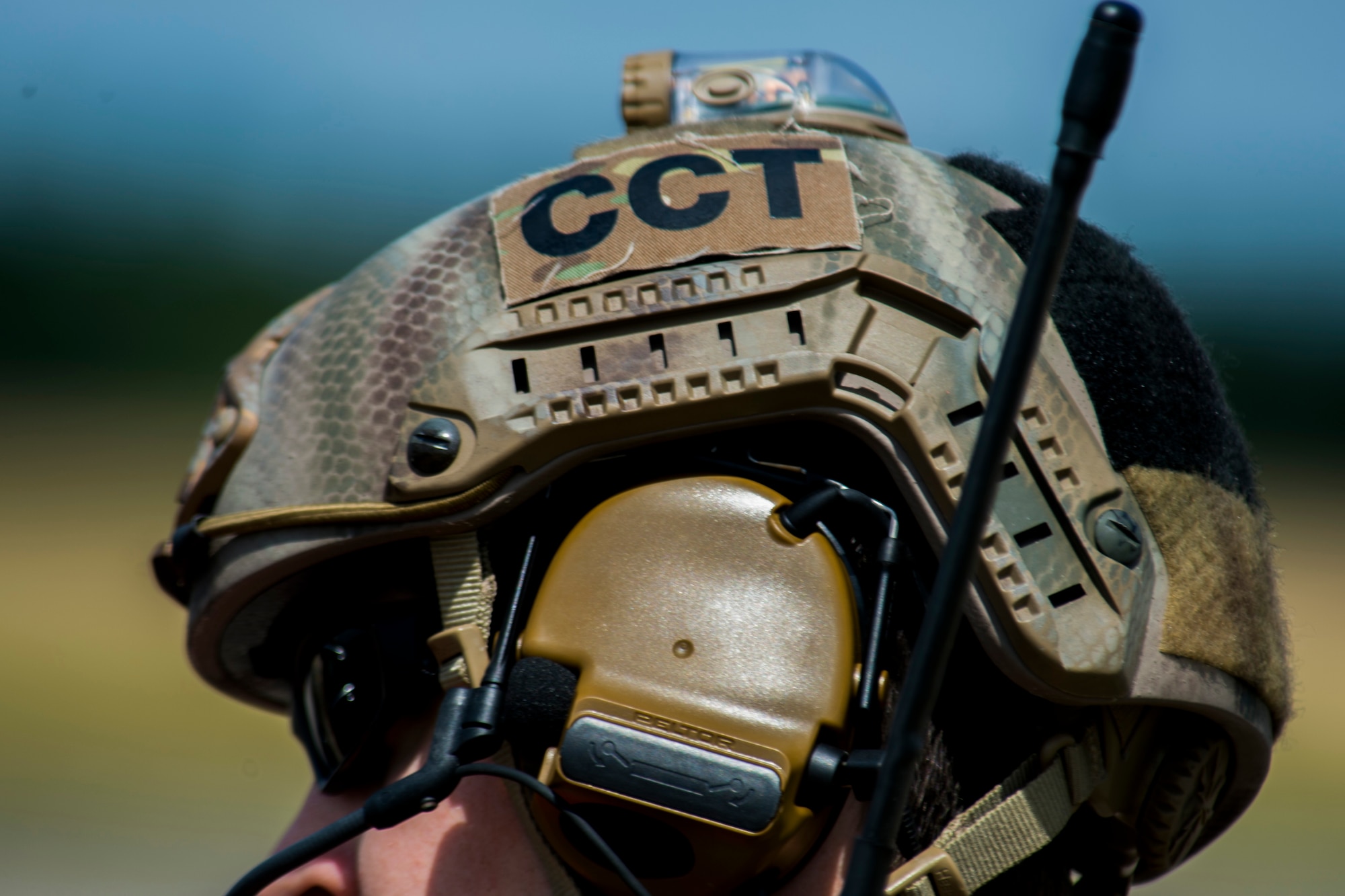 A 321st Special Tactics Squadron combat controller gears up before the start of an austere landing training exercise at Nowe Miasto, Poland, July 20, 2015. The 321st STS is based out of RAF Mildenhall, England. (U.S. Air Force photo by Airman 1st Class Luke Kitterman/Released)