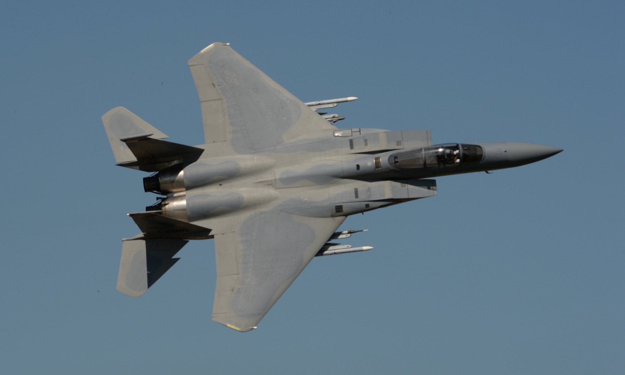 A U.S. Air National Guard F-15C Eagle fighter aircraft assigned to the 123rd Expeditionary Fighter Squadron flies over the flightline during a theater security package deployment July 21, 2015, at Campia Turzii, Romania. More than 200 Airmen from the 142nd Fighter Wing, Oregon Air National Guard, Portland, Oregon, are training with the Romanian air force as part of a European theater security package of F-15C Eagles deployed to Romania. (U.S. Air Force photo by Senior Airman Dylan Nuckolls/Released)