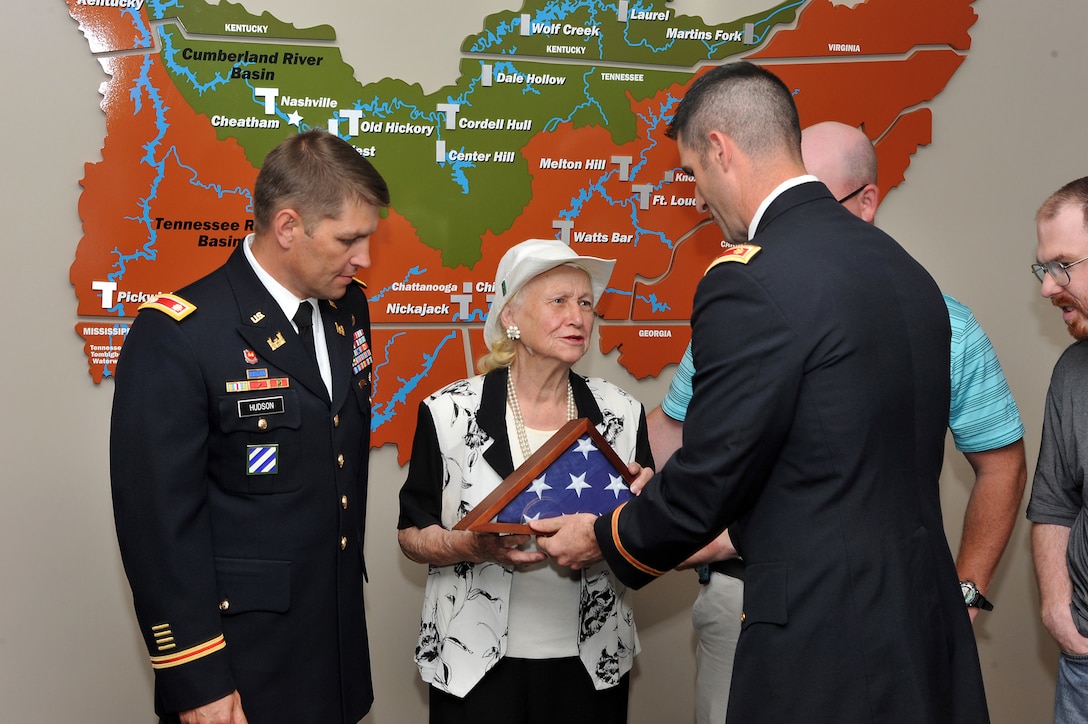 A U.S. Army Corps of Engineers Nashville District employee was posthumously awarded the Superior Civilian Service Award, a United States flag, flown over the U.S. Capitol, and recognized for forty years of government service during a ceremony at the district June, 9, 2015.  Philip L. Burney, a budget analyst in the Operations Division, who was nicknamed Nashville District’s ‘Gentle Giant’, passed away unexpectedly at his home, Feb. 1, 2015.  