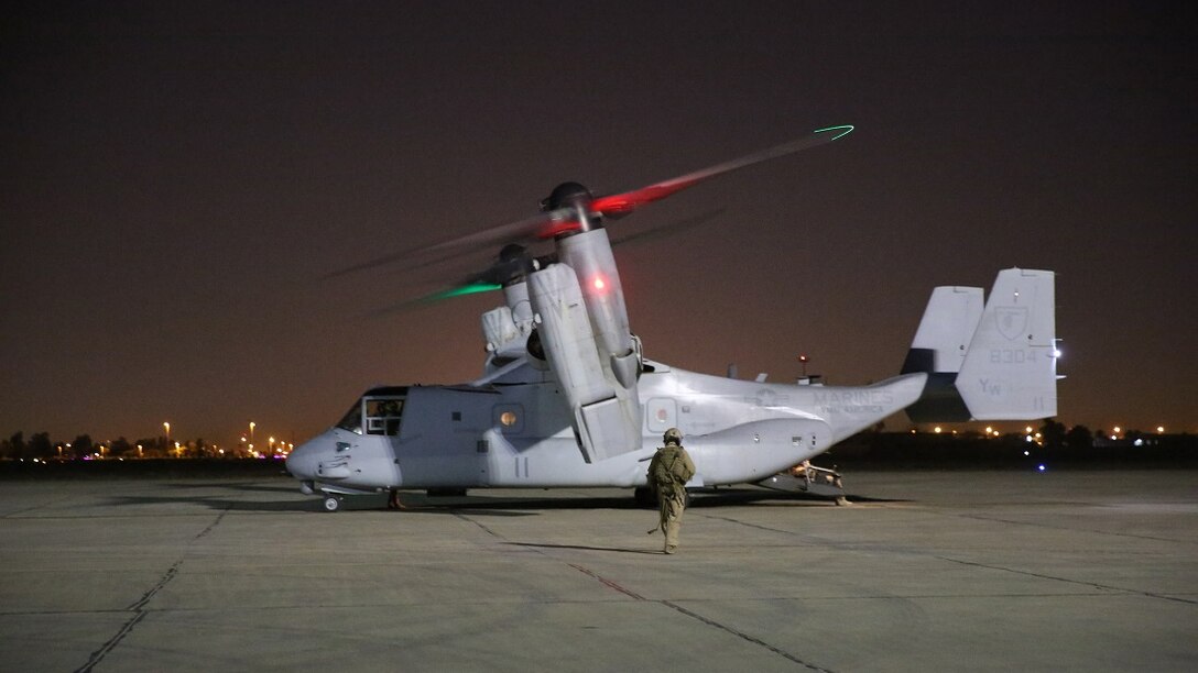 An MV-22 with Marine Medium Tiltrotor Squadron-165 (VMM-165), Special Purpose Marine Air-Ground Task Force—Crisis Response—Central Command, lands and refuels prior to another mission in Southwest Asia, July 15, 2015. The Marines of VMM – 165 celebrate the unit’s 50th anniversary while deployed with the SPMAGTF; providing long range assault support, troop transport and cargo delivery in the Central Command Area of Operations, as well as support to the Tactical Recovery of Aircraft and Personnel.