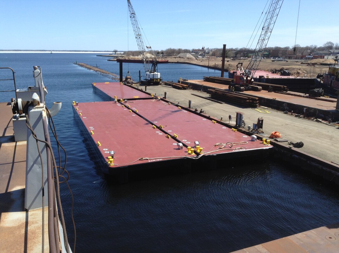 The U.S. Army Corps of Engineers' Marine Design Center managed design and construction of the USACE Mobile District's Flat Deck Barge. The vessel's mission is to store and transport stop logs on the Alabama River and Tenn-Tom Waterway. 