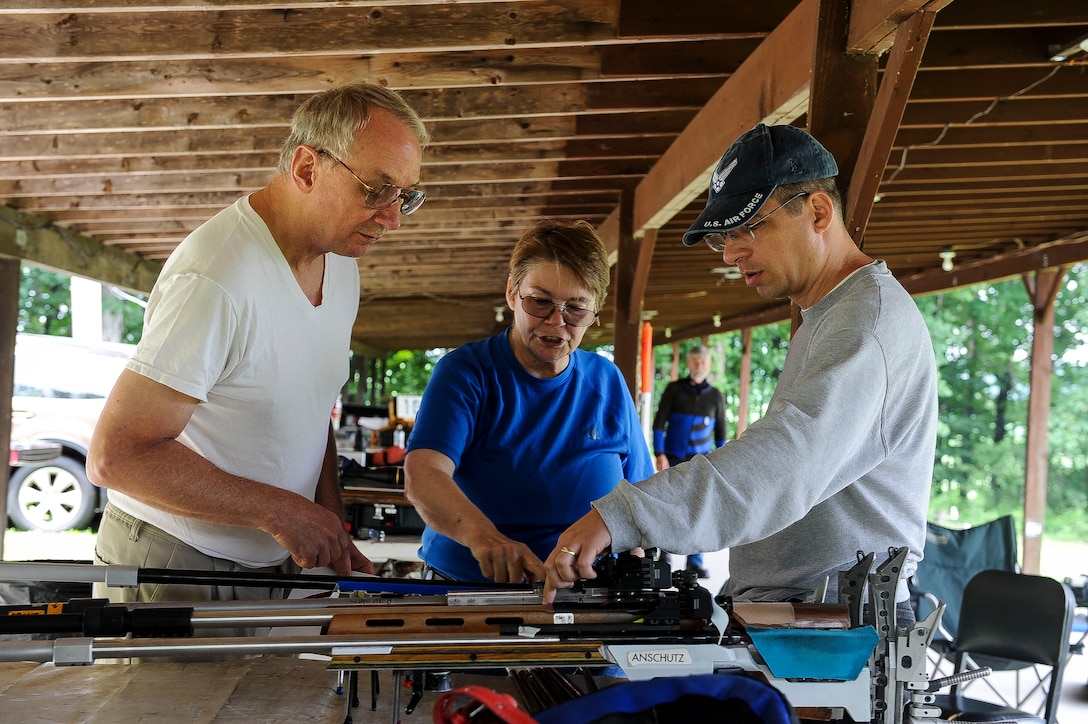 Lt. Col. Mark Gould (right) talks rifle setup with fellow students during a training class in New Freedom, Pa., June 26, 2015. Gould, a foreign liaison officer for the Defense Intelligence Agency’s Office of Partner Engagement at the Pentagon, has been involved in competitive shooting for the past 23 years and has been a member of the Air Force International Rifle Team for 17 years. (U.S. Air Force photo/Staff Sgt. Christopher Gross)