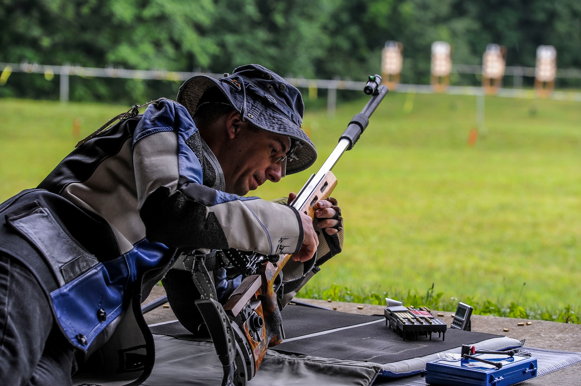 Lt. Col. Mark Gould gets into position to shoot his target during the Dave Cramer Memorial Smallbore Regional Prone Metric NRA Regional Tournament in New Freedom, Pa., June 27, 2015. Gould, a foreign liaison officer for the Defense Intelligence Agency’s Office of Partner Engagement at the Pentagon, finished second in his class and fourth overall at the tournament. Gould has been involved in competitive shooting for the past 23 years and has been a member of the Air Force International Rifle Team for 17 years. (U.S. Air Force photo/Staff Sgt. Christopher Gross)