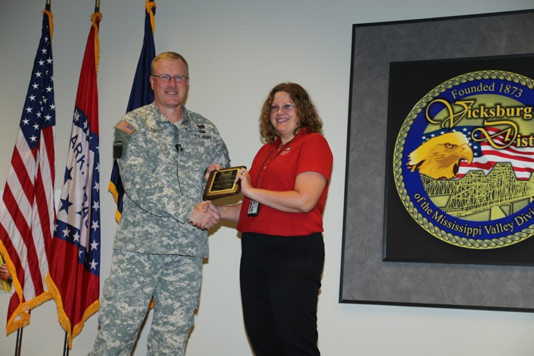 Sarah Koeppel of Operations Division received the Commander’s Public Service Award for her leadership, selfless service and stewardship through volunteerism.  She consistently gives back to the community by providing opportunities for tomorrow’s leaders to learn and observe, while enhancing the quality of life for the local community.