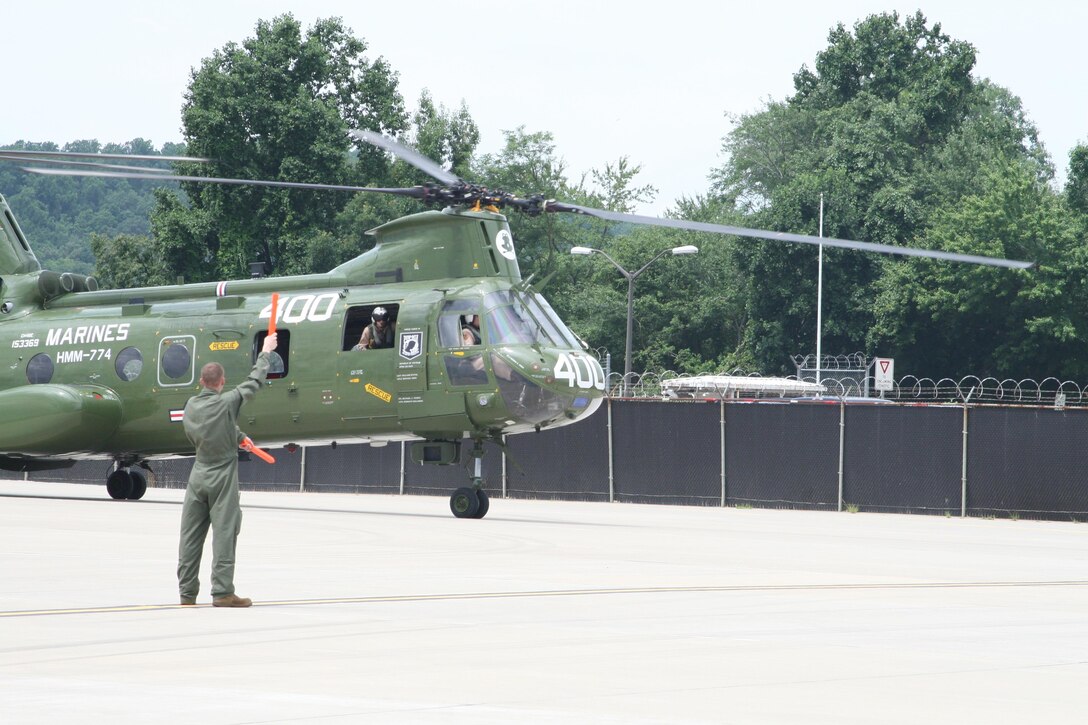 The CH-46 Phrog helicopter making its way back into a hangar on Turner Airfield. The CH-46 has supported missions for over 50 years and is also awaiting its retirement by the end of this month.