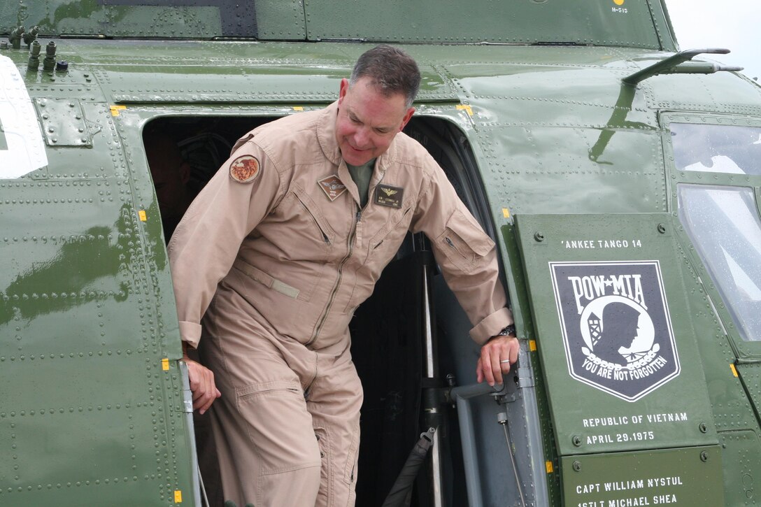 Maj. Gen. O’Donnell stepping off from his last flight at Turner Airfield. O’Donnell was unexpectedly sprayed with champagne from his close friend and colleague, Phrogphlyer consultant, John Morgenstern.