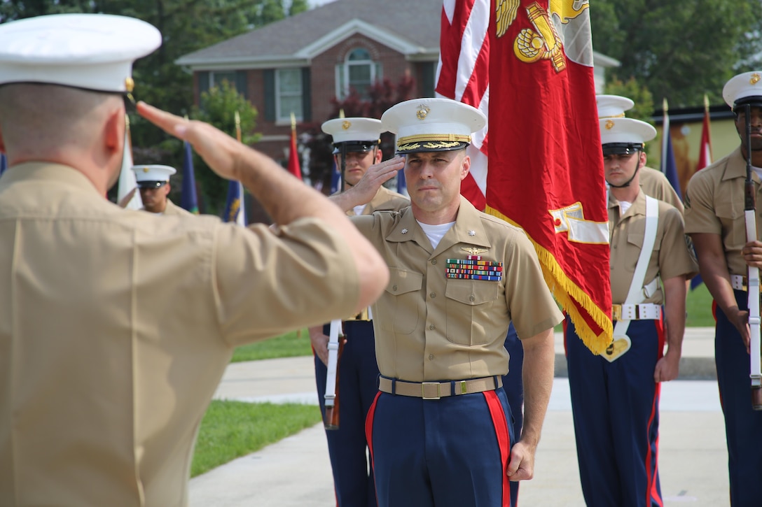 U.S. Marine Corps Lt. Col. Donald Moor, 4th Marine Corps District Executive Officer, salutes Lt. Col. Gerald Murphy, 4th MCD Operations Officer, during his retirement ceremony at the Defense Distribution Center Susquehanna in New Cumberland, Pennsylvania, July 2, 2015. Moor, a Lebanon, Missouri native who retired after 24 years of service, was awarded the Meritorious Service Medal for his service at the recruiting district. (U.S. Marine Corps photo by Cpl. Kyle Welshans/Released)