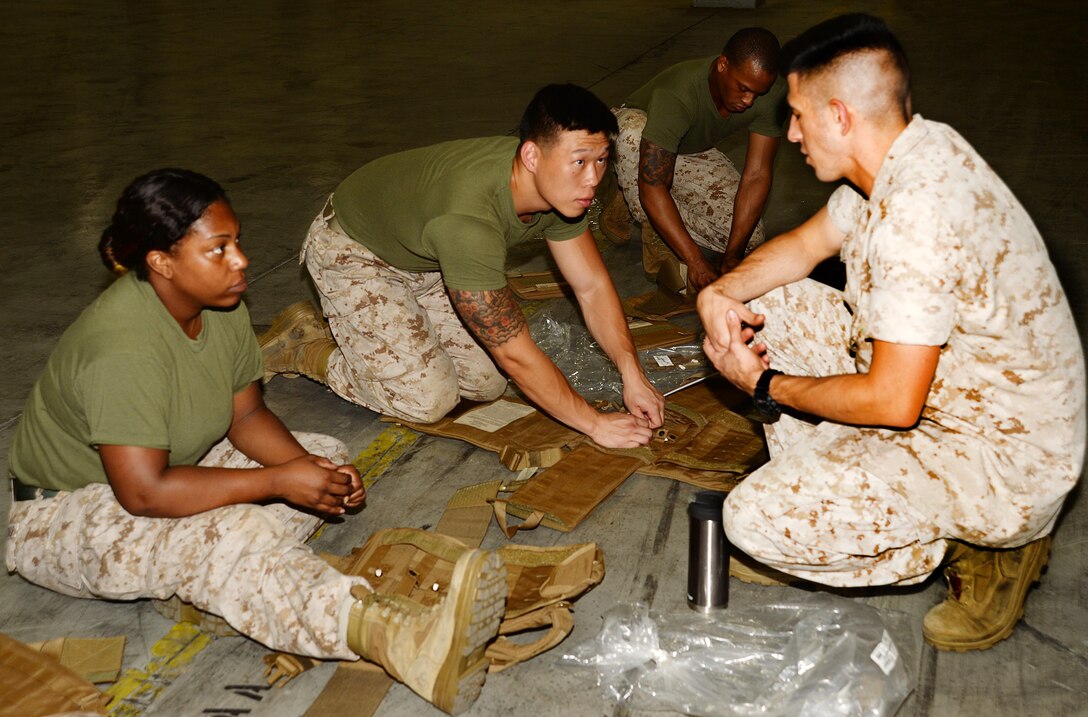 More than 20 reservists with Detachment 2, Supply Company, Combat Logistics Battalion-451, from Anacostia, Washington, D.C.; and 4th Civil Affairs Group from Miami, Florida, hone their supply warehouse skills during training aboard Marine Corps Logistics Base Albany, July 22.