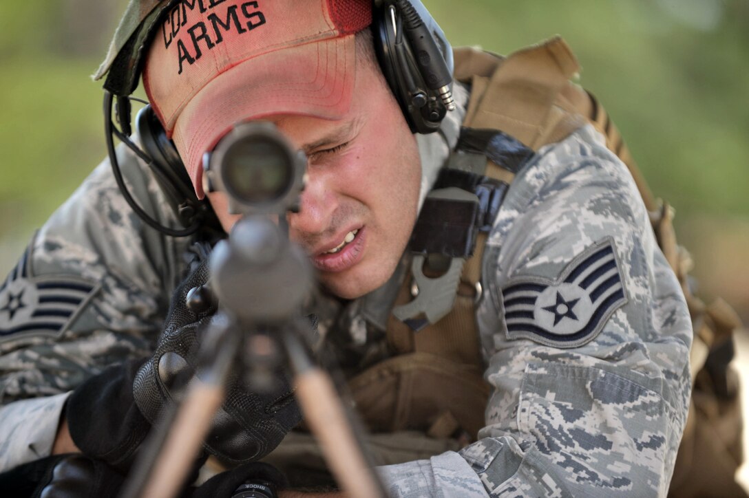 Staff Sgt. Joseph Pico trains at the firing range on Francis S. Gabreski Air National Guard Base, N.Y., July 17, 2015. Pico is a combat arms training and maintenance instructor with the 106th Rescue Wing. He’s responsible for training the base populace on the use of small arms. (New York Air National Guard photo/Staff Sgt. Christopher S. Muncy)
