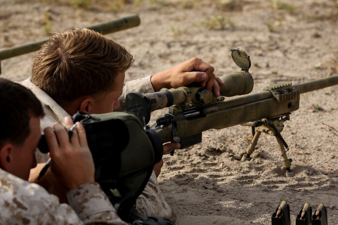 Marines with 1st Reconnaissance Battalion, 1st Marine Division, 1st Marine Expeditionary Force, conduct unknown distance shooting during the Pre-Scout Sniper Course aboard Marine Corps Base Camp Pendleton, Calif., July 17, 2015. The six-week long course is designed to prepare and screen students for the follow-on training at Scout Sniper Basic School. (Photo by LCpl. Danielle Rodrigues/Released)