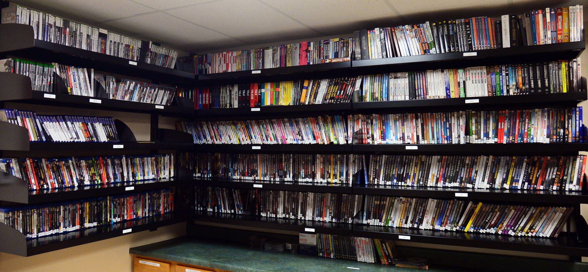 The Malmstrom Air Force Base Central Dorm Management Office movie and video game rental library free to Airmen. Airmen may choose to rent from a formidable collection of films and video games in a variety of viewing compatibility formats. (U.S. Air Force photo/Airman 1st Class Magen M. Reeves)