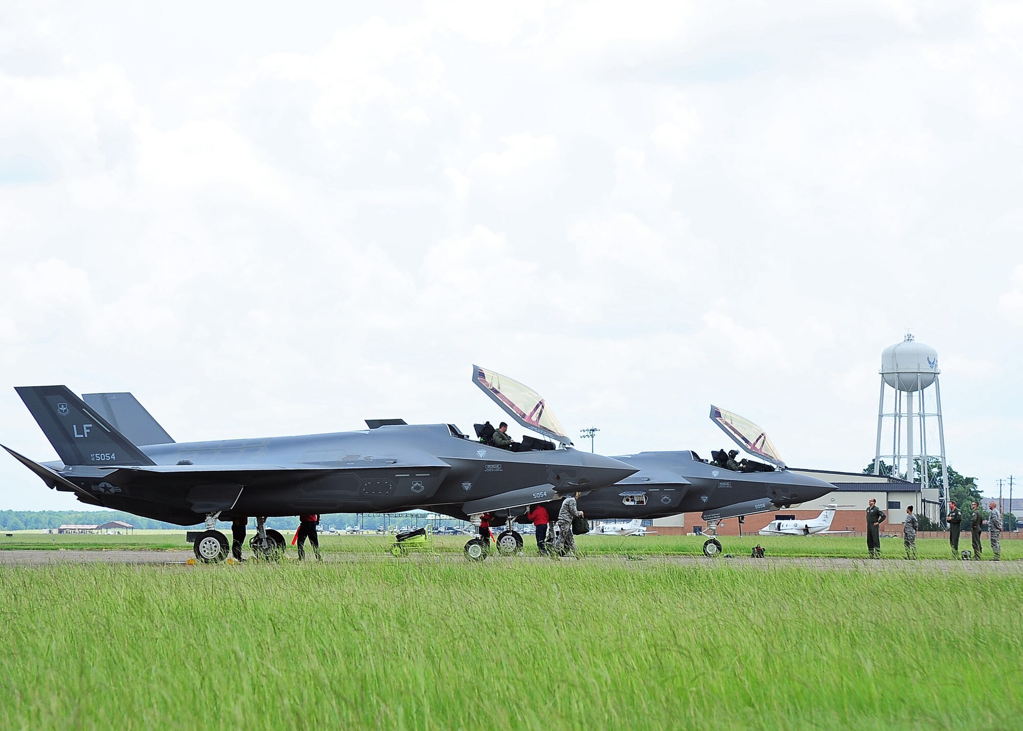 Columbus Air Force Base senior leadership greets Brig. Gen. Scott Pleus, 56th Fighter Wing Commander, upon his arrival in an F-35A Lightning II July 23 on the Columbus Air Force Base, Mississippi flight line. The fifth-generation fighter provided the instructor and student pilots of Columbus AFB the opportunity to see the F-35 up close and learn about its capabilities. (U.S. Air Force photo/Airman 1st Class Daniel Lile)