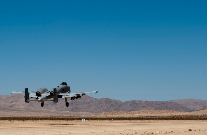 An A-10 Thunderbolt II takes off from the National Training Center range at Fort Irwin, Calif., July 16, 2015. The mission of the NTC range is to provide tough, realistic joint and combined arms training. (U.S. Air Force photo by Airman 1st Class Mikaley Towle)