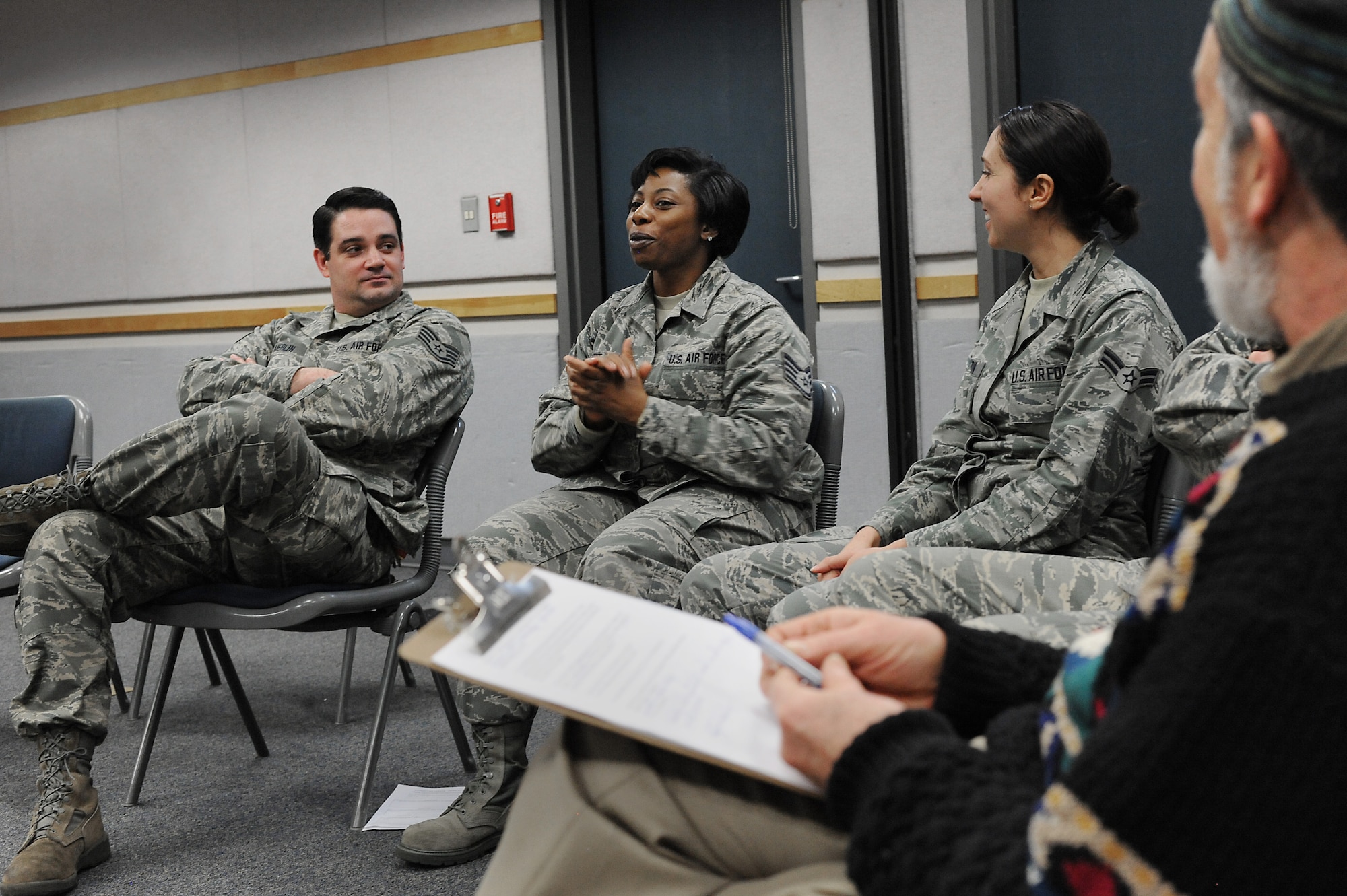 Oregon Air National Guard Staff Sgt. Jennifer Scott, center, shares some of experiences following one-on-one compassionate listening exercise during the 142nd Fighter Wing’s Diversity and Inclusion Counsel meeting, Feb. 8, 2015, Portland Air National Guard Base, Ore. The Diversity and Inclusion Counsel meets during Unit Training Assembly weekends to help develop the total force crucial for mission success. (U.S. Air National Guard photo by Tech. Sgt. John Hughel, 142nd Fighter Wing Public Affairs/Released)