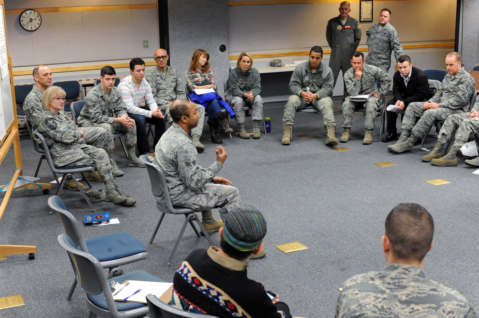 Oregon Air National Guard Senior Airman Brandon Bingham sits in the center circle during a group activity as part of the 142nd Fighter Wing’s Diversity and Inclusion Counsel meeting, Feb. 8, 2015, Portland Air National Guard Base, Ore. The Diversity and Inclusion Counsel helps foster communication by recognizing that a diverse set of experiences, perspectives, and backgrounds are crucial to mission success. (U.S. Air National Guard photo by Tech. Sgt. John Hughel, 142nd Fighter Wing Public Affairs/Released)