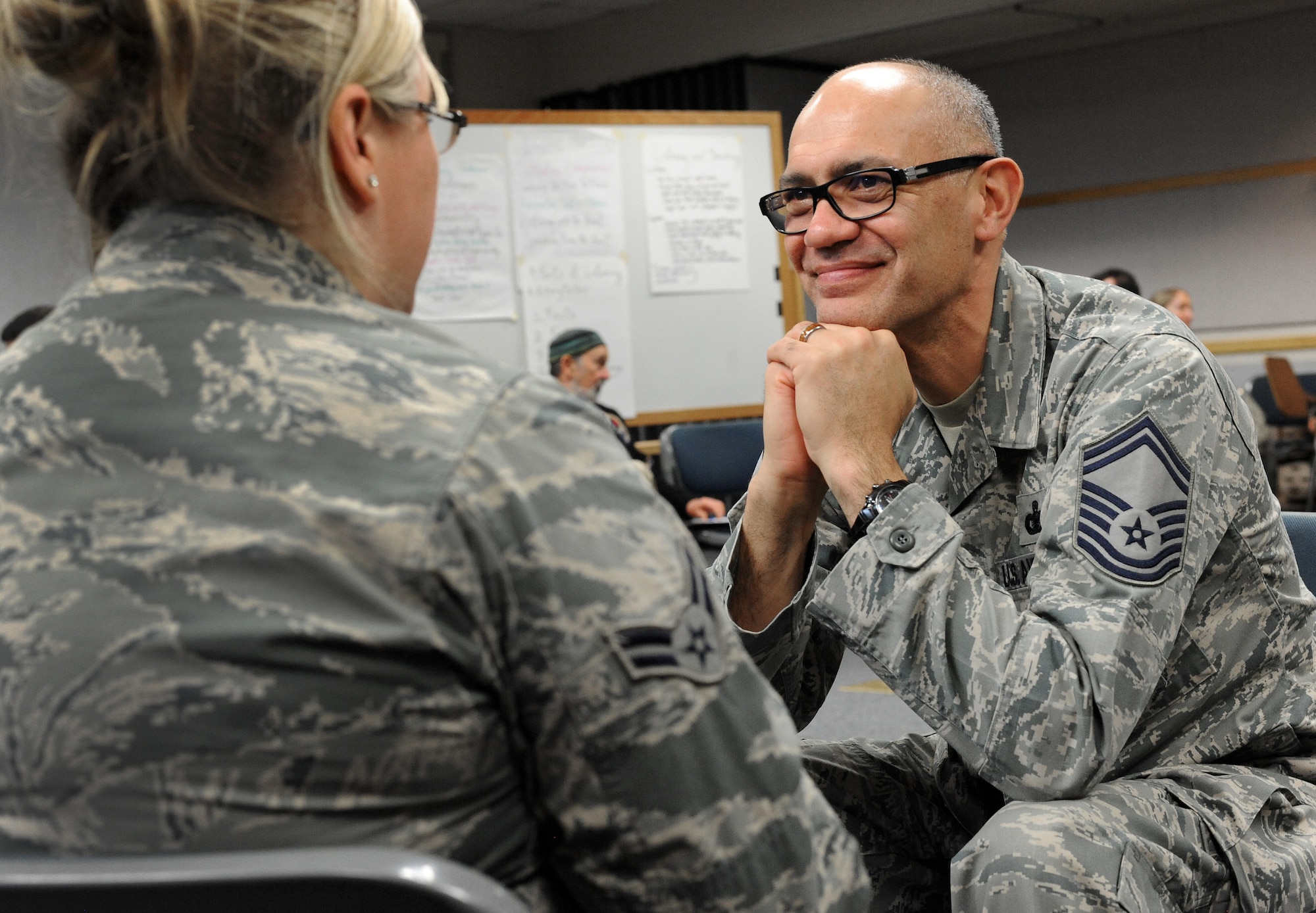 Oregon Air National Guard Senior Master Sgt. David Brunstad, right, quietly participates in a compassionate listing exercise with Airman 1st Class Michelle Johnson, left, during a meeting of the 142nd Fighter Wing’s Diversity and Inclusion Counsel, Feb. 8, 2015, Portland Air National Guard Base, Ore. The Diversity and Inclusion Counsel meets during Unit Training Assembly weekends to help develop the total force crucial for mission success. (U.S. Air National Guard photo by Tech. Sgt. John Hughel, 142nd Fighter Wing Public Affairs/Released)