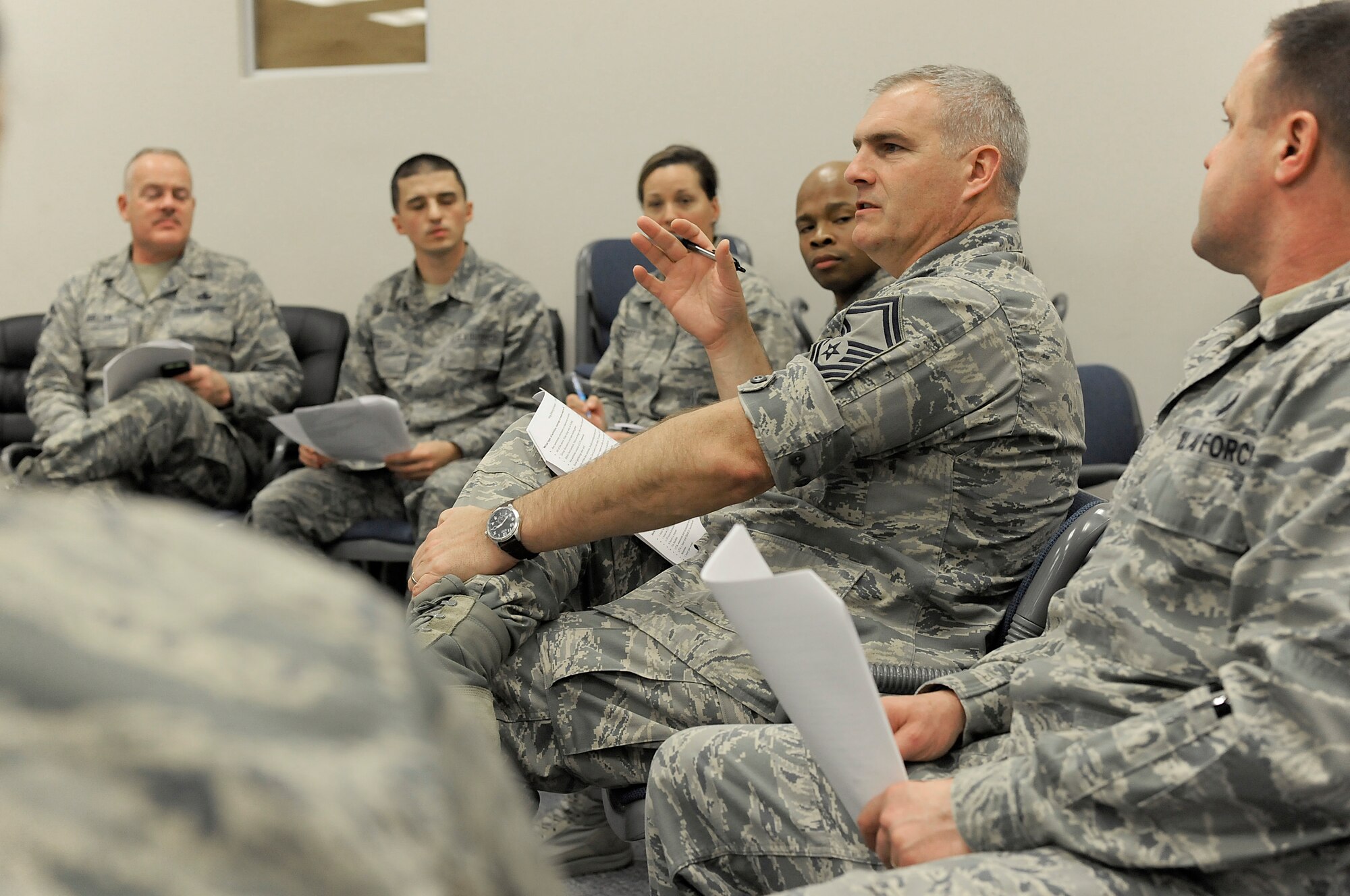 Oregon Air National Guard Senior Master Sgt. Robert Maca, center, participates in a group discussion as part of the unit’s Diversity and Inclusion Counsel meeting, Jan. 11, 2015, Portland Air National Guard Base, Ore. The Diversity and Inclusion Counsel meets during Unit Training Assembly weekends to help develop the total force crucial for mission success. (U.S. Air National Guard photo by Tech. Sgt. John Hughel, 142nd Fighter Wing Public Affairs/Released)