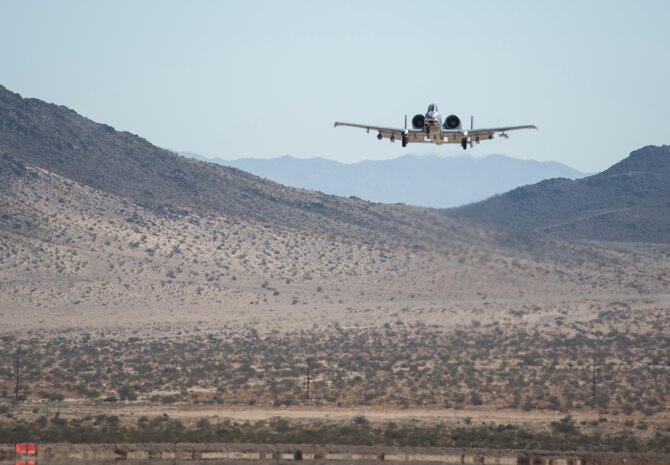 An A-10 Thunderbolt II prepares to land in support of Green Flag West 15-08.5 on the National Training Center at Fort Irwin, Calif., July 16, 2015. Landing and meeting with the ground force commander gives both parties a mutual understanding of what each side brings to the fight. (U.S. Air Force photo by Airman 1st Class Mikaley Towle)
