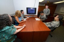 Financial analysts of the 22nd Comptroller Squadron attend a financial briefing, July 23, 2015, at McConnell Air Force Base, Kan. The briefing is to prepare the Team McConnell analysts for the fiscal year closeout and ensure the squadrons at McConnell have enough money to complete their missions. (U.S. Air Force photo by Airman 1st Class Christopher Thornbury)
