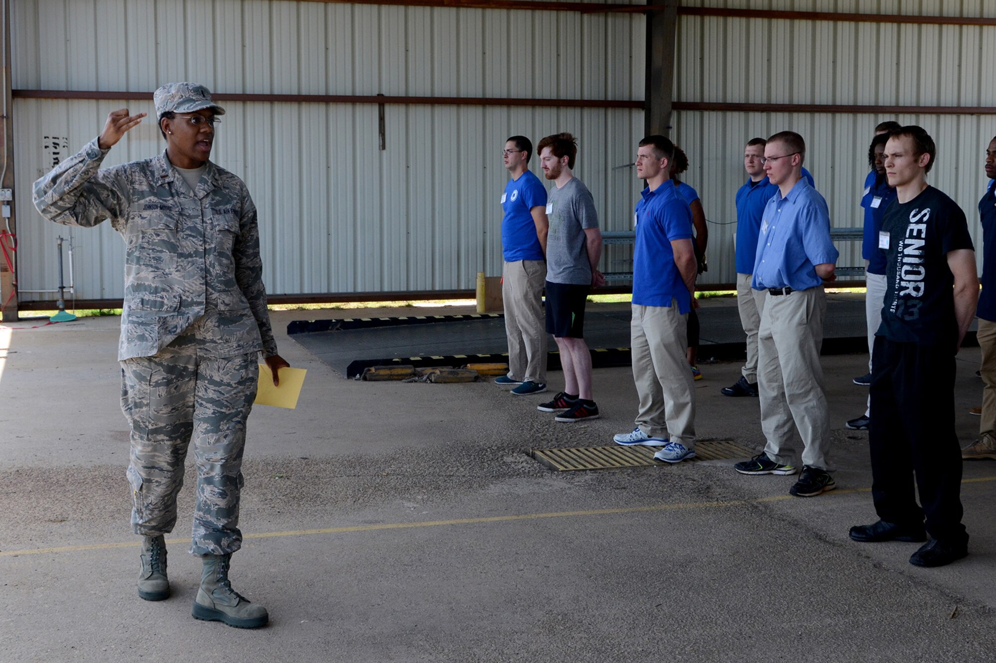 U.S. Air Force 2nd Lt. Marlene Johnson-Moore, commander of the 169th Student Flight, instructs trainees on drill and ceremony at McEntire Joint National Guard Base, S.C., June 13, 2013. The trainees were taught several facing and drill movements in order to prepare them for Basic Military Training. (U.S. National Guard photo by Amn Megan Floyd/Released)