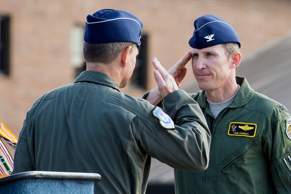 U.S. Air Force Col. Thomas Kunkel, 23d Wing commander, renders a salute to Maj. Gen. H.D. Polumbo Jr., Ninth Air Force commander, after assuming command during the 23d WG Change of Command ceremony July 23, 2015, at Moody Air Force Base, Ga. Moody welcomed back Kunkel who was formerly the 41st Rescue Squadron commander in 2009. (U.S. Air Force photo by Airman Greg Nash/Released)