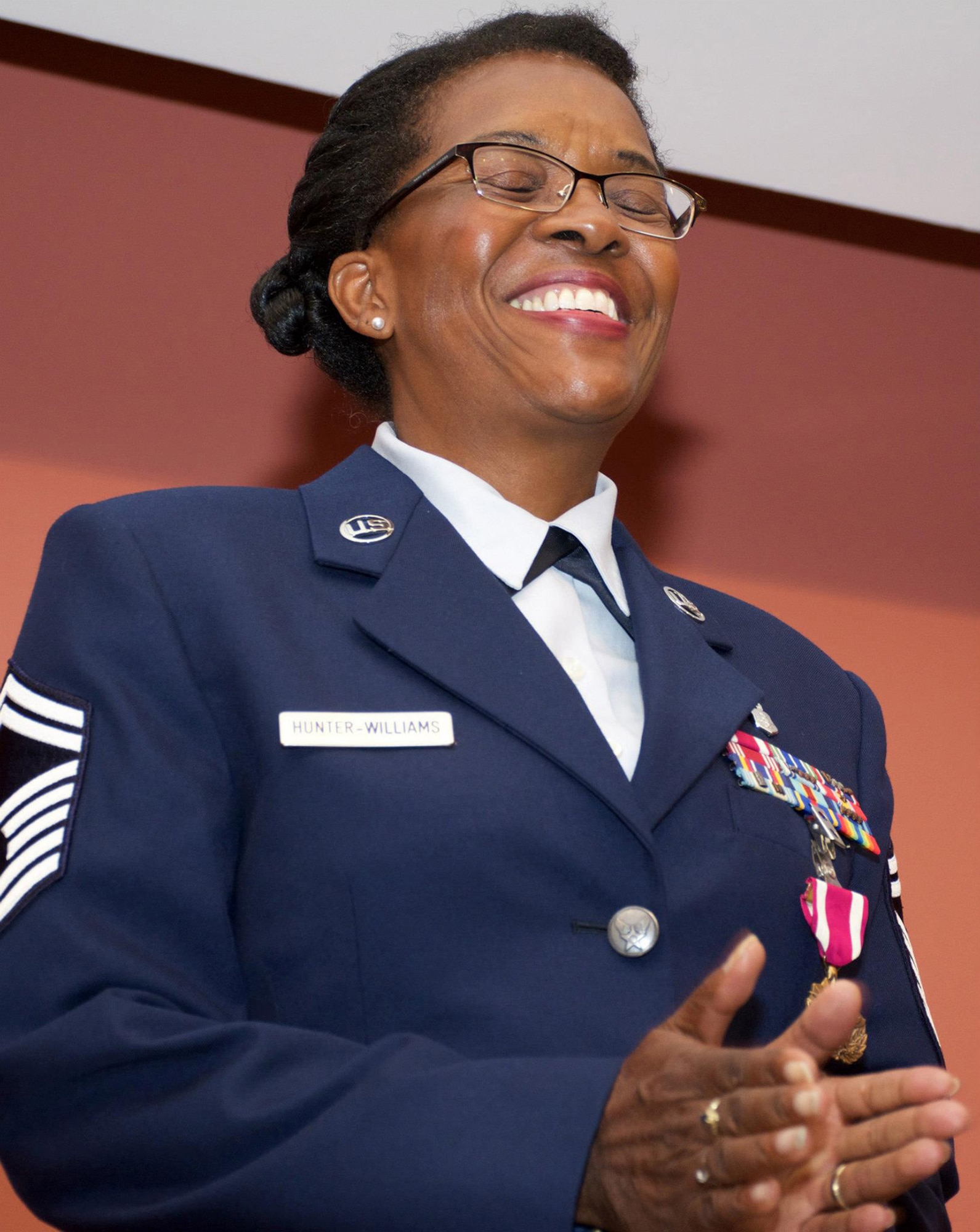TRAVIS AIR FORCE BASE, Calif. -- Senior Master Sgt. Gwen L. Hunter-Williams, 349th Aerospace Medicine Squadron superintendent of medical administration, retired at Travis Air Force Base, Calif., July 12, 2015, after 33 years of service in the Army and Air Force Reserve. (U.S. Air Force photo/2nd Lt. Stephen J. Collier)
