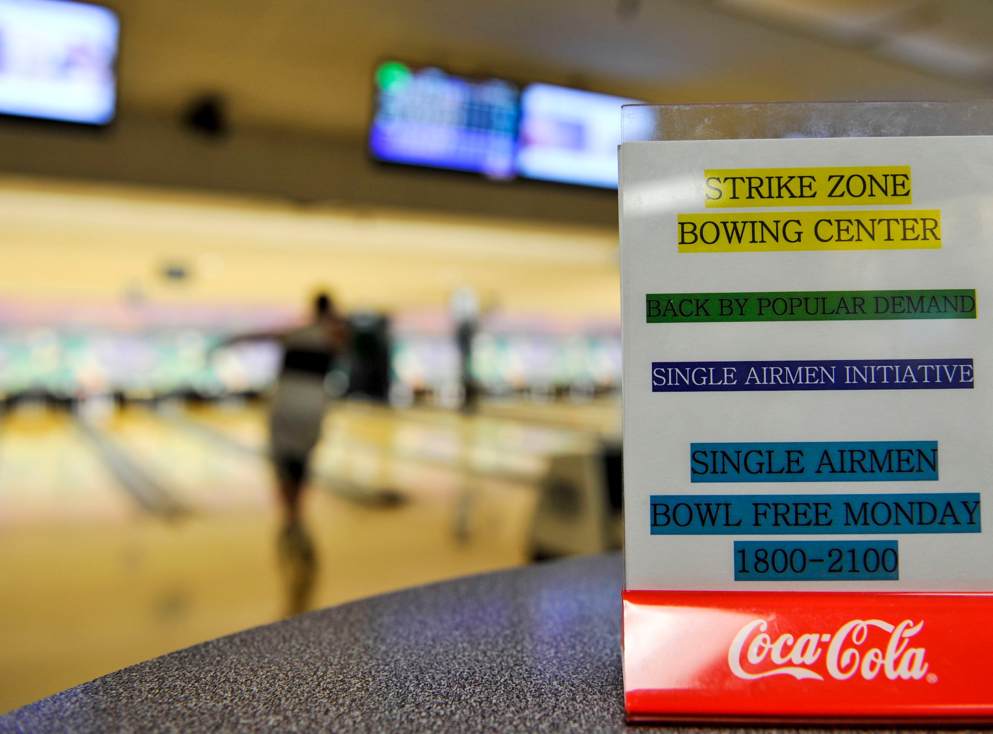 Strike Zone Bowling Center offers free Monday night bowling free to all single active duty members July 8, 2015, at Little Rock Air Force Base, Ark. Other specials include dollar days, cosmic bowling, league bowling, colorama, family fun day and more. (U.S. Air Force photo by Senior Airman Stephanie Serrano)

