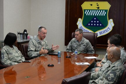 Brig. Gen. Lenny Richoux, Director of Services, Headquarters Air Force, listens as Col. Dan Merry, Air Force Mortuary Affairs Operations commander, explains the importance of the AFMAO mission during the general’s orientation of the Charles C. Carson Center for Mortuary Affairs, Dover Air Force Base, Del., July 21, 2015. (U.S. Air Force photo/Senior Airman Robert Gunn)